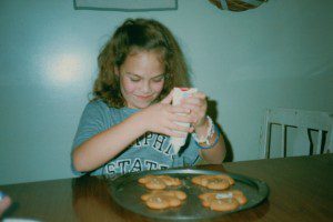Me, circa 1987 hard at work, decorating my cookies.