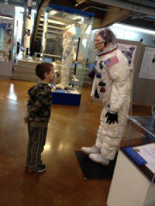 Homeschool advantage number 432: On this random day in March we decided to visit the Frontiers of Flight Museum. I love having the freedom to let them learn hands on.