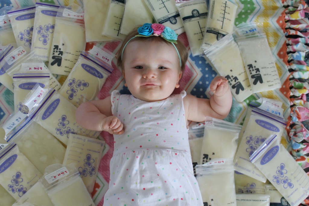 baby girl with breastmilk