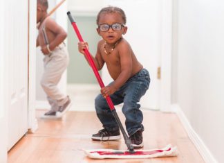 boys mopping floor for chores