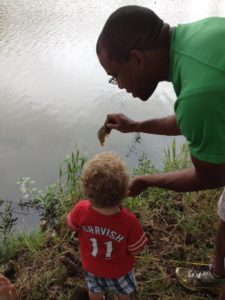 dad and child fishing