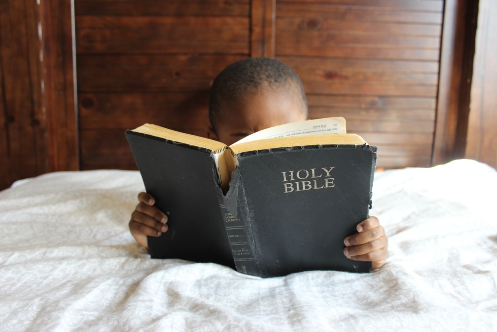 Child Reads Bible