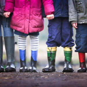 children wearing rain boots