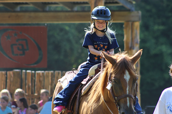 Campers can enjoy horseback riding at Camp Olympia summer camp.
