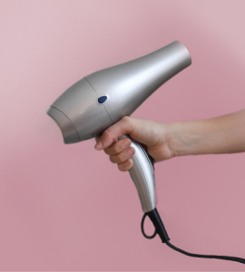 Use a hair dryer to style long hair.