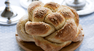 Eat round challah bread on Rosh Hashanah. 