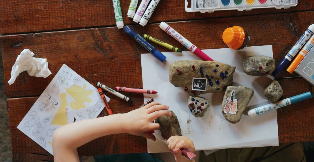 Do fall nature crafts for kids, such as painting rocks.