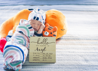 Hire a newborn photographer to capture memories.