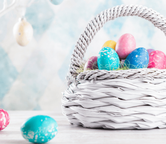 An white Easter basket filled with eggs.